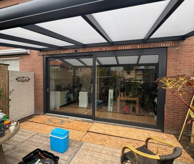 schuifpui achtertuin Kunststof schuifpui omgeving Enschede